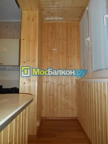 Отделка балконов деревянной вагонкой в Москве