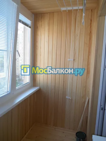 Отделка балконов деревянной вагонкой в Москве
