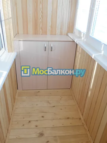 Отделка балконов деревянной вагонкой в Москве