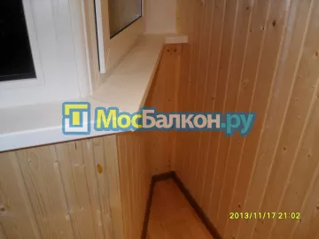 Отделка балконов деревянной вагонкой в Москве