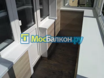 Отделка балкона и лоджии пластиковыми ПВХ панелями в Жуковском от компании МосБалкон